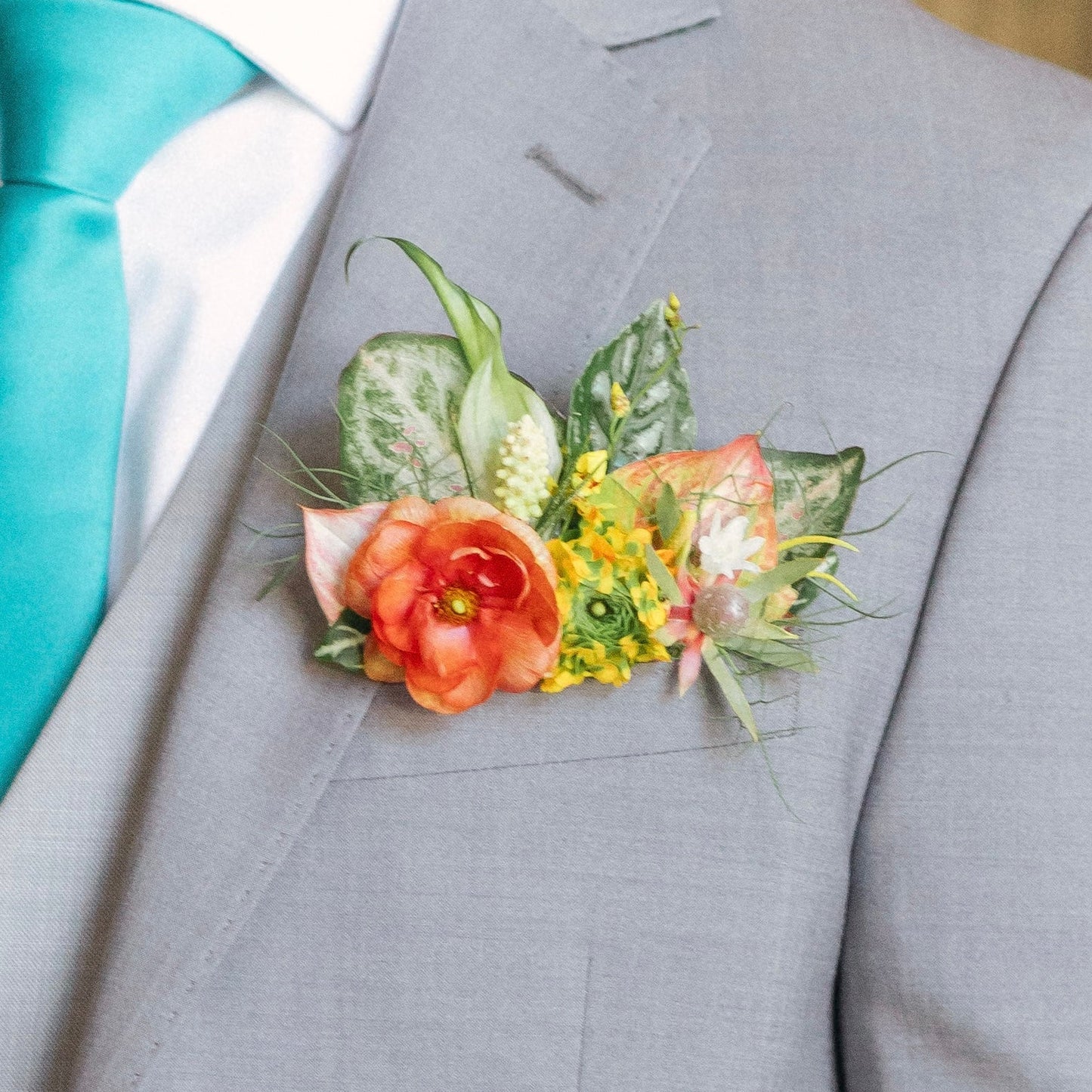 Pocket Square Boutonniere with tropical leaves