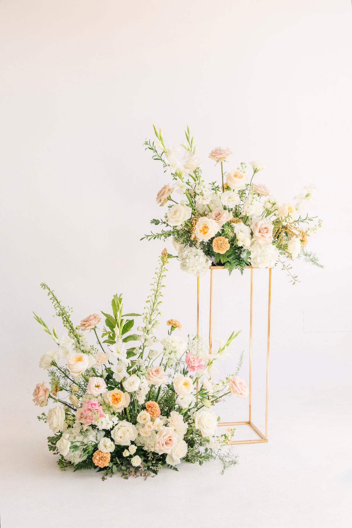 Pedestal Arrangement with Whimsical Greenery