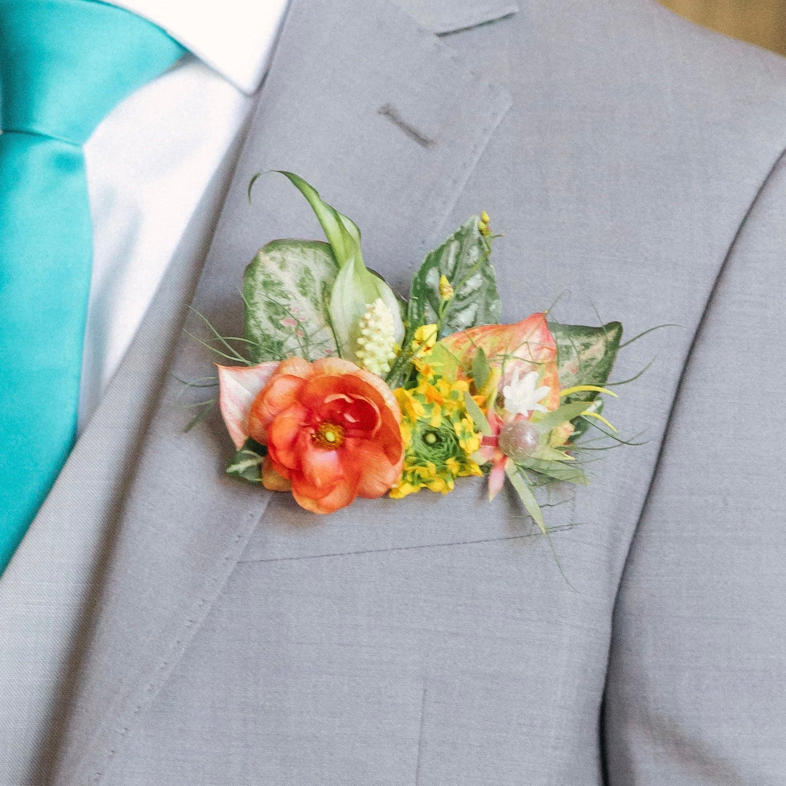 Pocket Square Boutonniere with tropical leaves