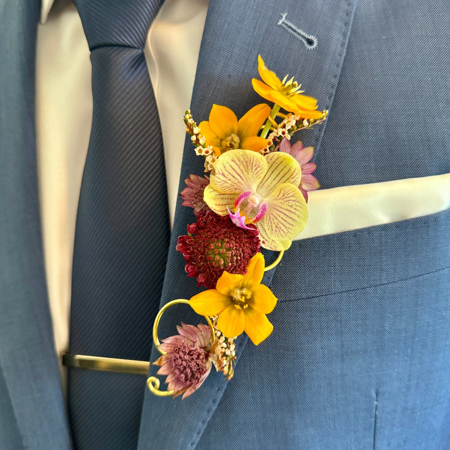 Bright and colorful signature lapel piece