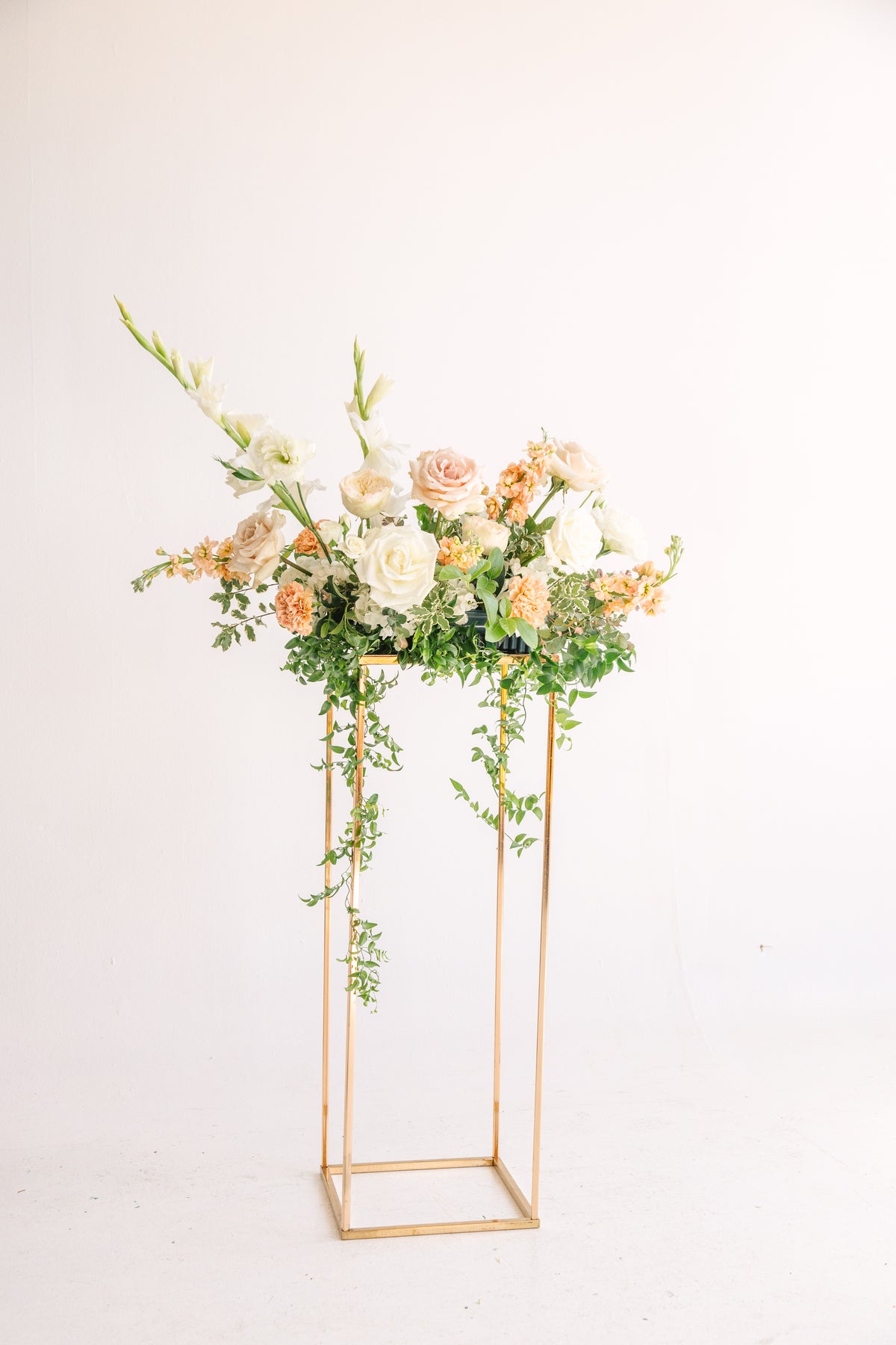 Pedestal Arrangement with Whimsical Greenery
